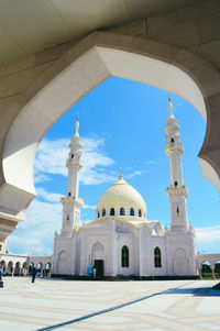 White mosque against blue sky