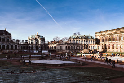 View of buildings in town against sky