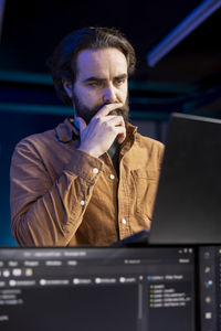 Young man using laptop