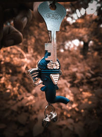 High angle view of decoration hanging on metal