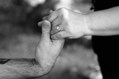 Close-up of couple hands