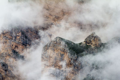 Smoke emitting from volcanic mountain