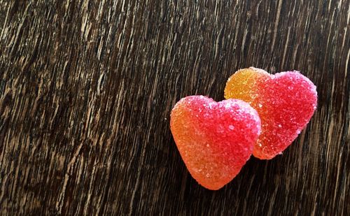 Close-up of heart shape on pink