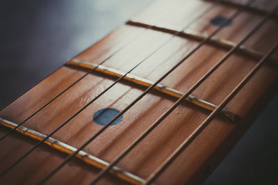 Close-up of electric guitar fretboard