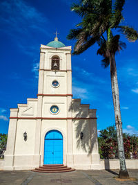 Low angle view of church against blue sky