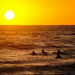 Scenic view of sea at sunset