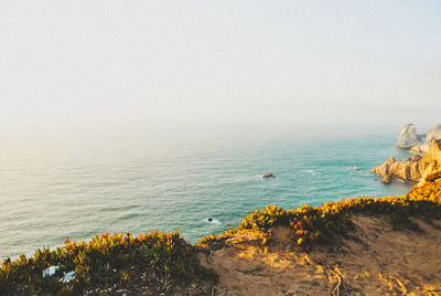 Scenic view of sea against clear sky