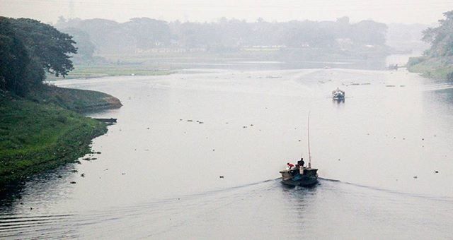 water, transportation, nautical vessel, boat, mode of transport, high angle view, waterfront, tranquil scene, tranquility, scenics, beauty in nature, nature, men, sea, mountain, leisure activity, travel, river, lifestyles