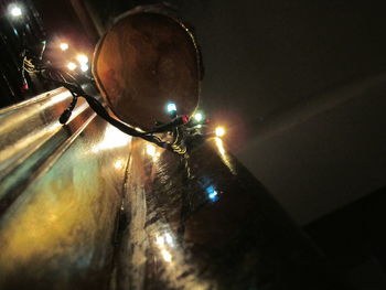Low angle view of illuminated christmas lights