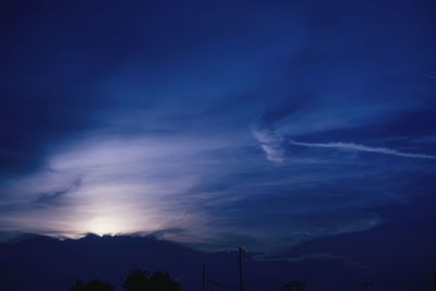 Low angle view of vapor trails in sky
