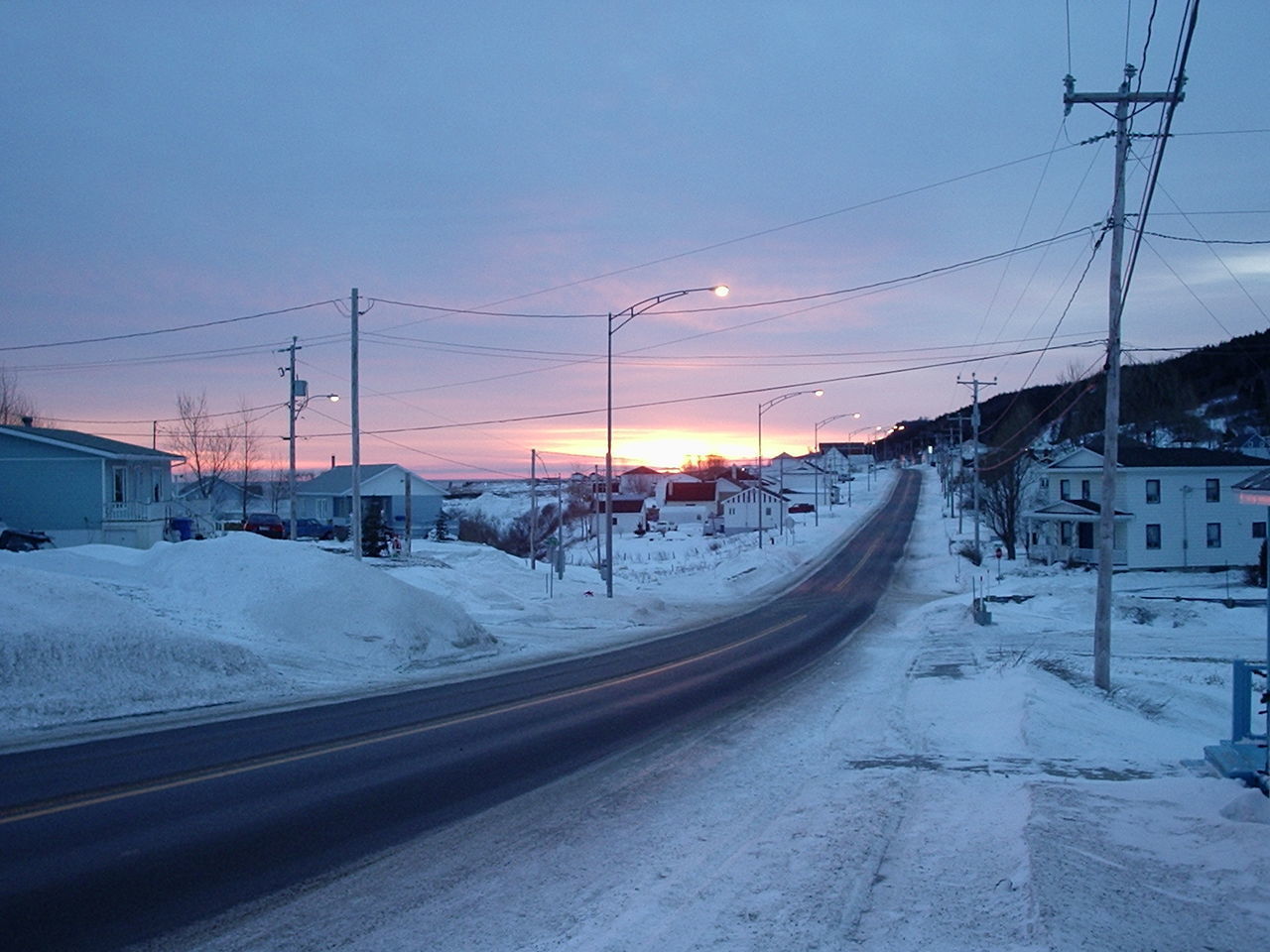 SNOW COVERED RAILROAD TRACKS DURING WINTER