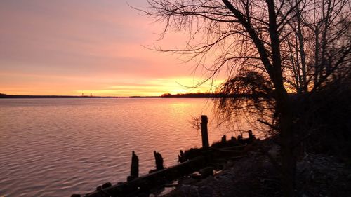 Scenic view of sea against sky at sunset