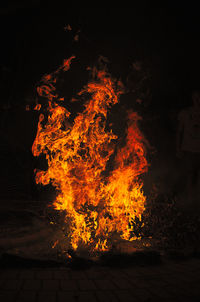 Bonfire on field at night