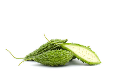 Close-up of green leaf against white background