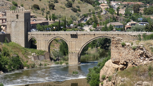 Arch bridge over river