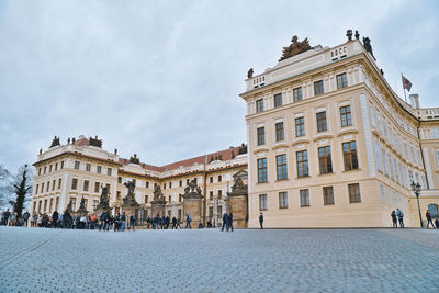 View of buildings in town against sky