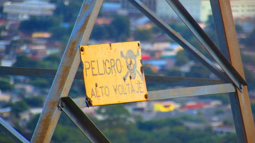 Close-up of yellow sign