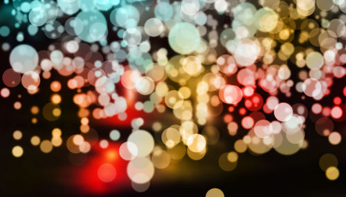 Defocused image of illuminated christmas lights