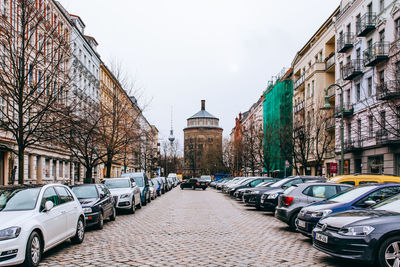 Cars parked on city street