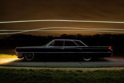 Cadillac sedan deville at night