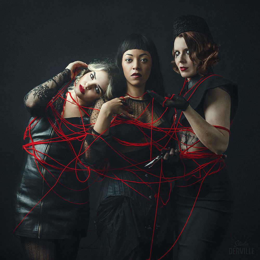 adult, women, young adult, studio shot, two people, black background, indoors, portrait, female, technology, looking at camera, sports, red, emotion, clothing, togetherness