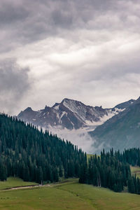 Scenic view of alpine landscape against sky