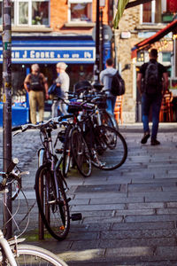 Bicycles parked on street in city of dublin