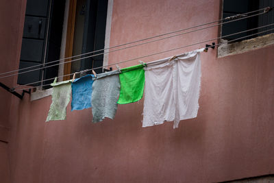 Low angle view of clothes hanging on a rope