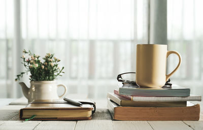 Close-up of coffee cup on table