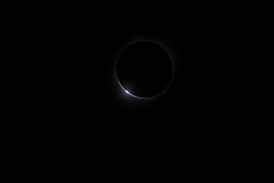 Low angle view of moon against sky at night