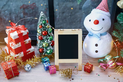 Close-up of christmas decorations on table