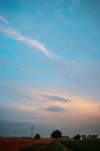 Scenic view of landscape against sky during sunset