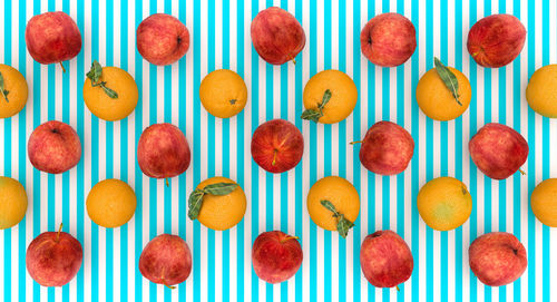 Directly above shot of fruits on colored background