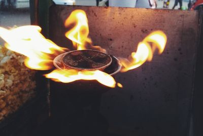 Close-up of lit candle