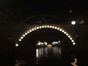 Low angle view of illuminated tunnel