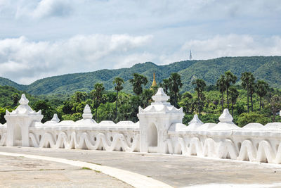 View of temple against cloudy sky