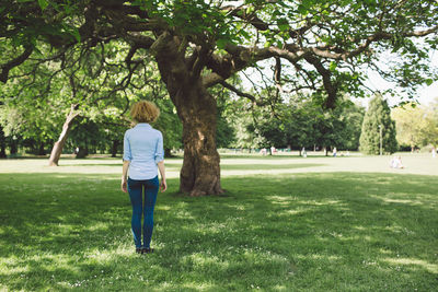 Rear view of man standing in park