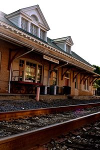 Railroad tracks against clear sky