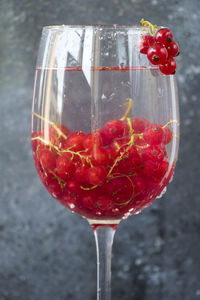 Close-up of red wine glass