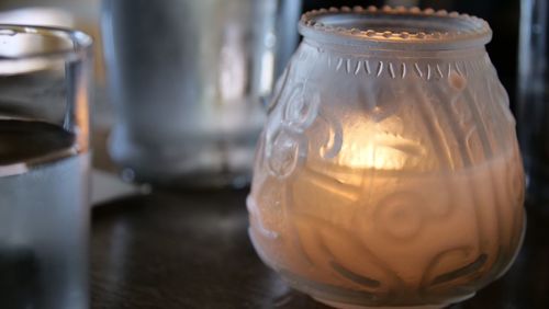 Close-up of drink in glass jar on table