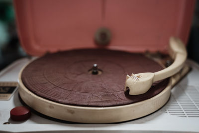 Close-up of turntable on table