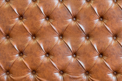 Full frame shot of brown bed headboard