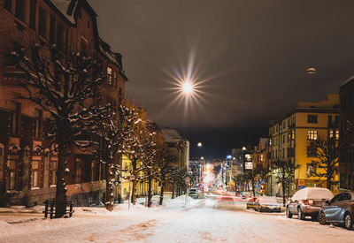 Illuminated street at night
