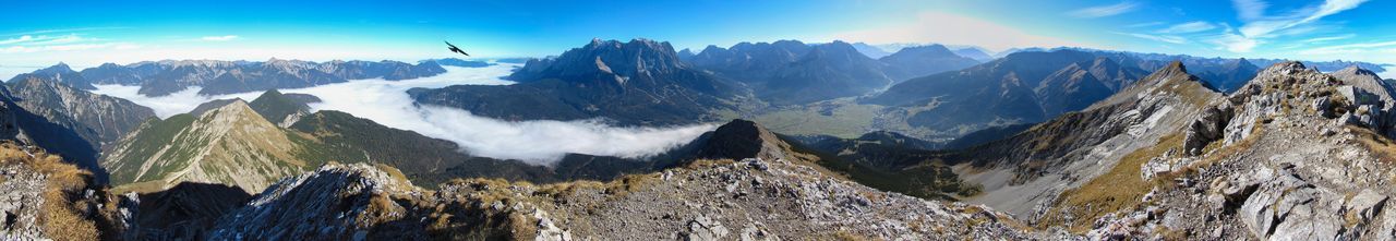 Panoramic view of landscape and mountains against sky