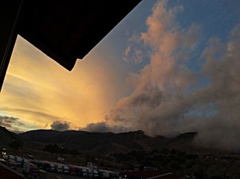 Clouds over mountain range