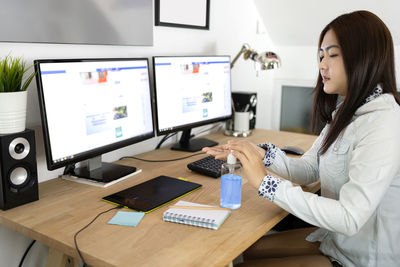 Woman working on table