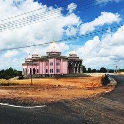 View of historical building against cloudy sky