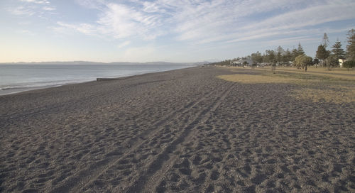 Scenic view of beach against sky
