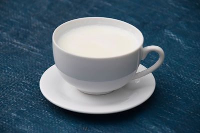 High angle view of coffee cup on table