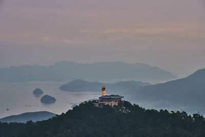Scenic view of mountains against sky during sunset
